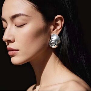 Modern Sculpted Silver Swirl Clip-On Earrings
